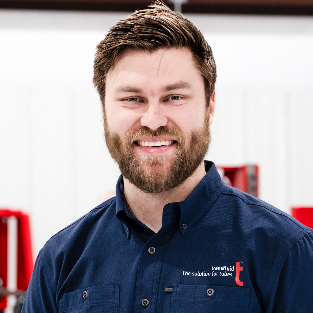 Porträt eines Mitarbeiters im technischen Service von transfluid.